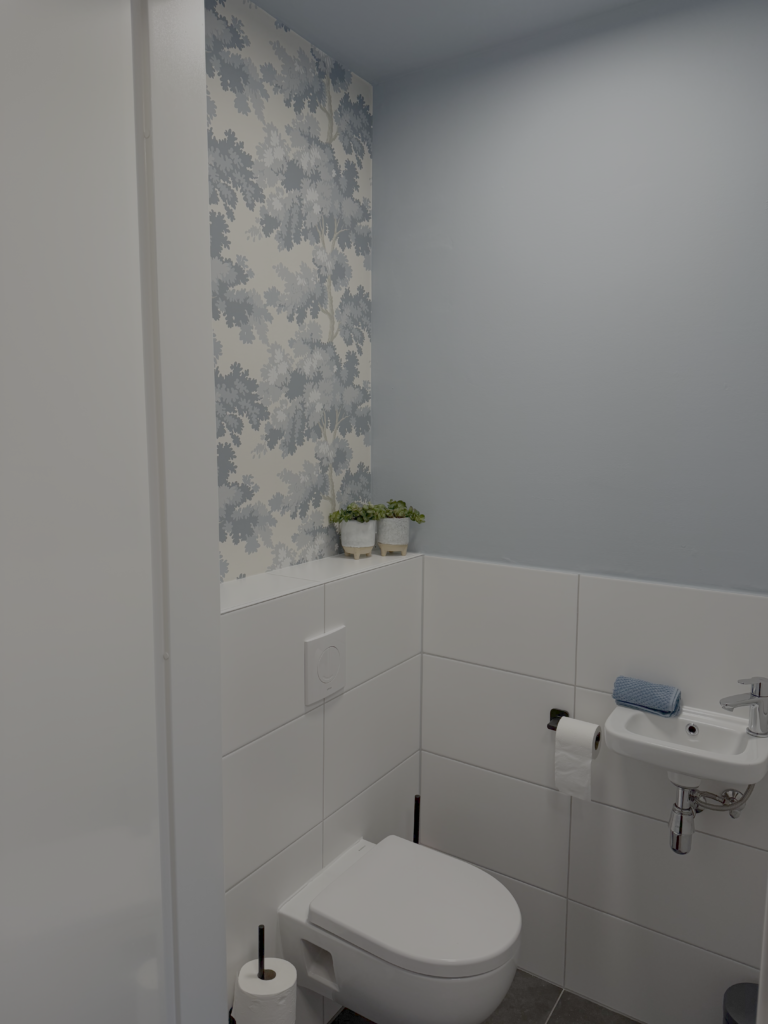 Toilet met blauw bomenbehang en lichtblauwe wand